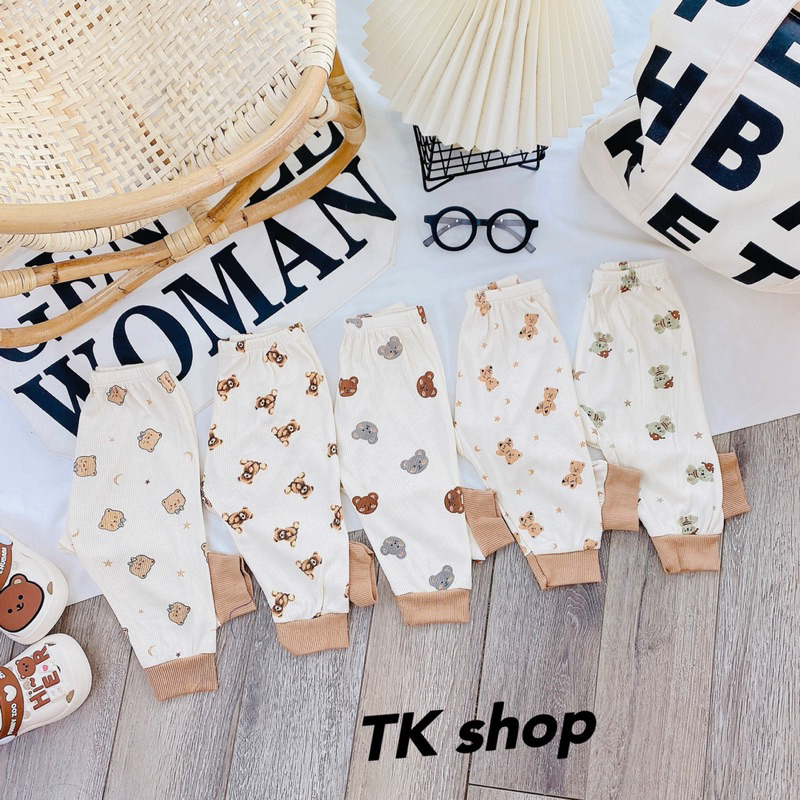 Quần dài thun tăm nền kem hoa văn