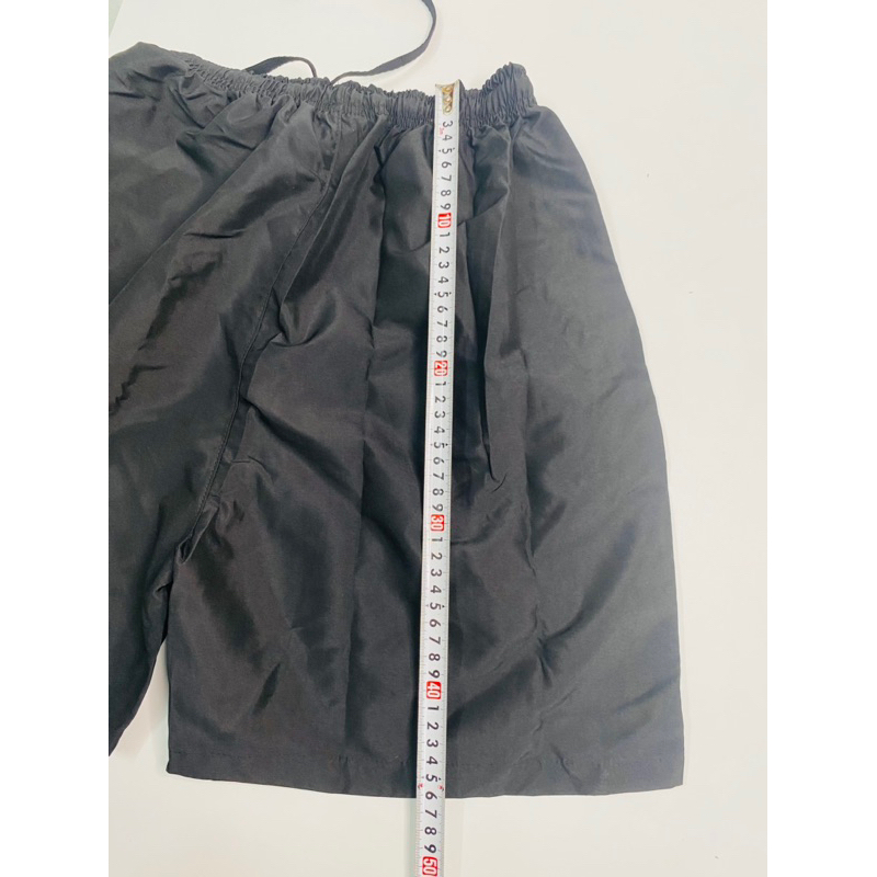 Quần đùi gió axe màu đen