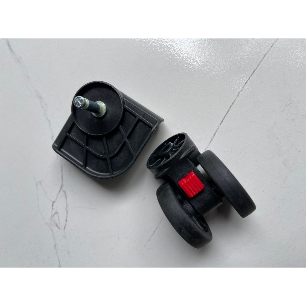 Bánh xe thay thế có chốt tháo màu đỏ dành cho Vali khung nhôm khóa sập