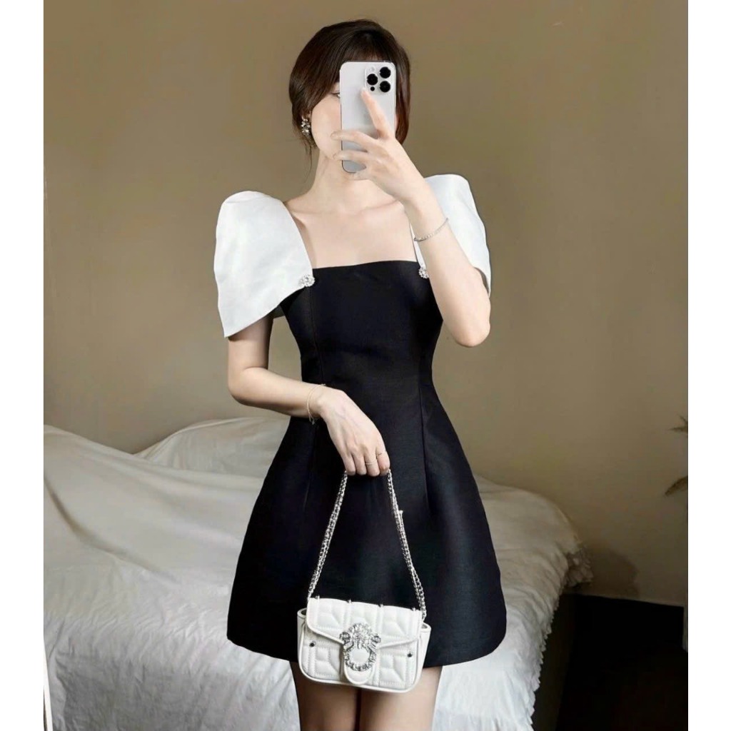 Đầm thiết kế dự tiệc đen phối tay trắng phồng