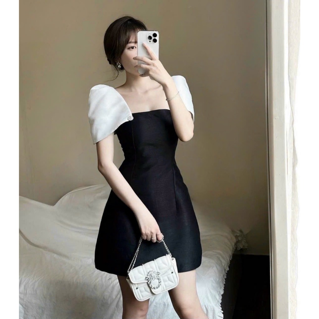Đầm thiết kế dự tiệc đen phối tay trắng phồng