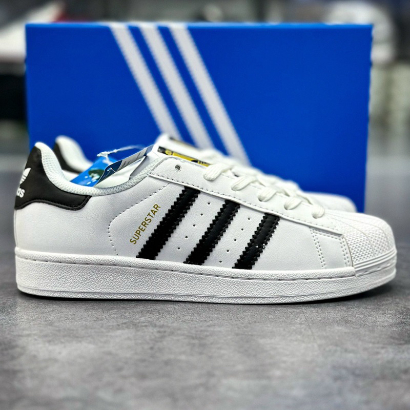Giày_Adidas Superstar Màu Trắng 3 Sọc Đen Tem Vàng,Giày thể thao nam nữ Adidas mũi sò trắng sọc đen bản S.Cấp