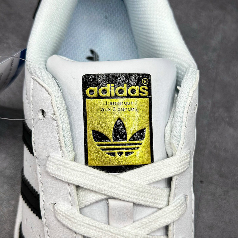 Giày_Adidas Superstar Màu Trắng 3 Sọc Đen Tem Vàng,Giày thể thao nam nữ Adidas mũi sò trắng sọc đen bản S.Cấp