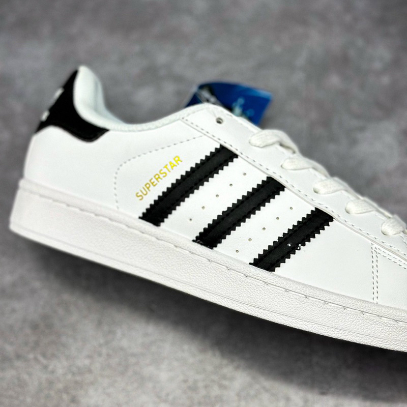 Giày_Adidas Superstar Màu Trắng 3 Sọc Đen Tem Vàng,Giày thể thao nam nữ Adidas mũi sò trắng sọc đen bản S.Cấp