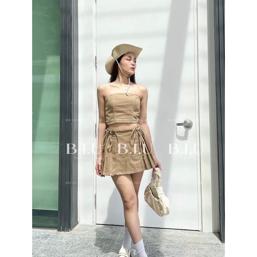 Set áo quây crotop chân váy phối xếp ly dây belt nhún thắt nơ Nora Set Biu Clothing BB0144 màu nâu rêu