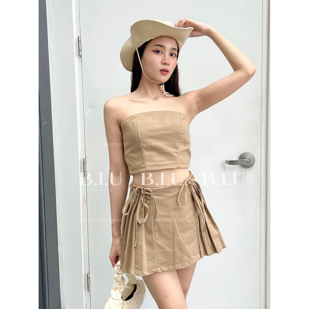 Set áo quây crotop chân váy phối xếp ly dây belt nhún thắt nơ Nora Set Biu Clothing BB0144 màu nâu rêu