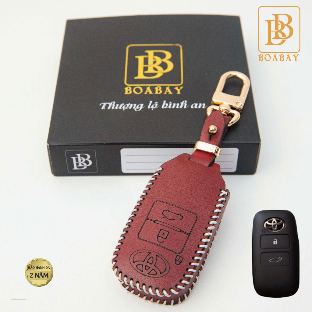 Bao da chìa khóa xe ôtô BB toyota yaris cross hev 2023 bọc chìa khóa smartkey da thật chính hãng OTOBOX khắc tên sđt