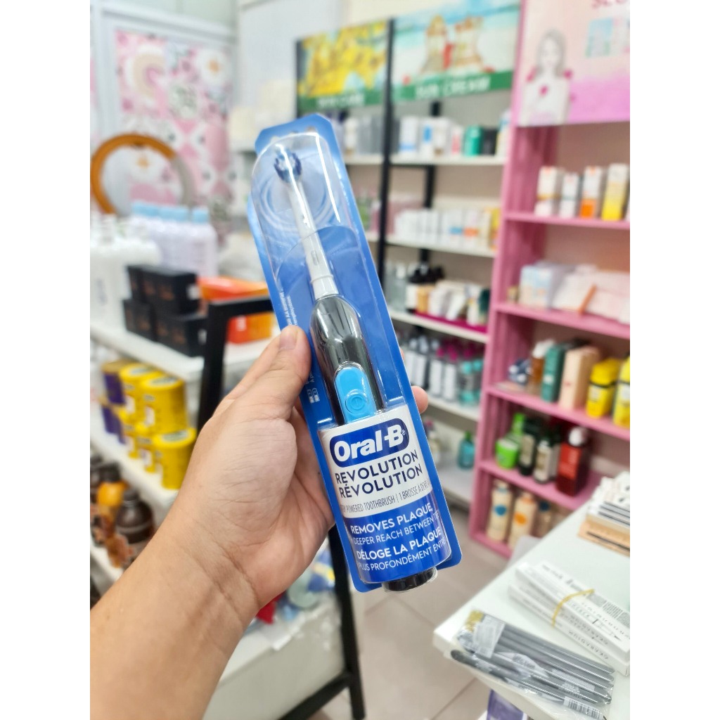Bàn chải đánh răng dùng Pin Oral-B Revolution Battery Toothbrush with Brush Head