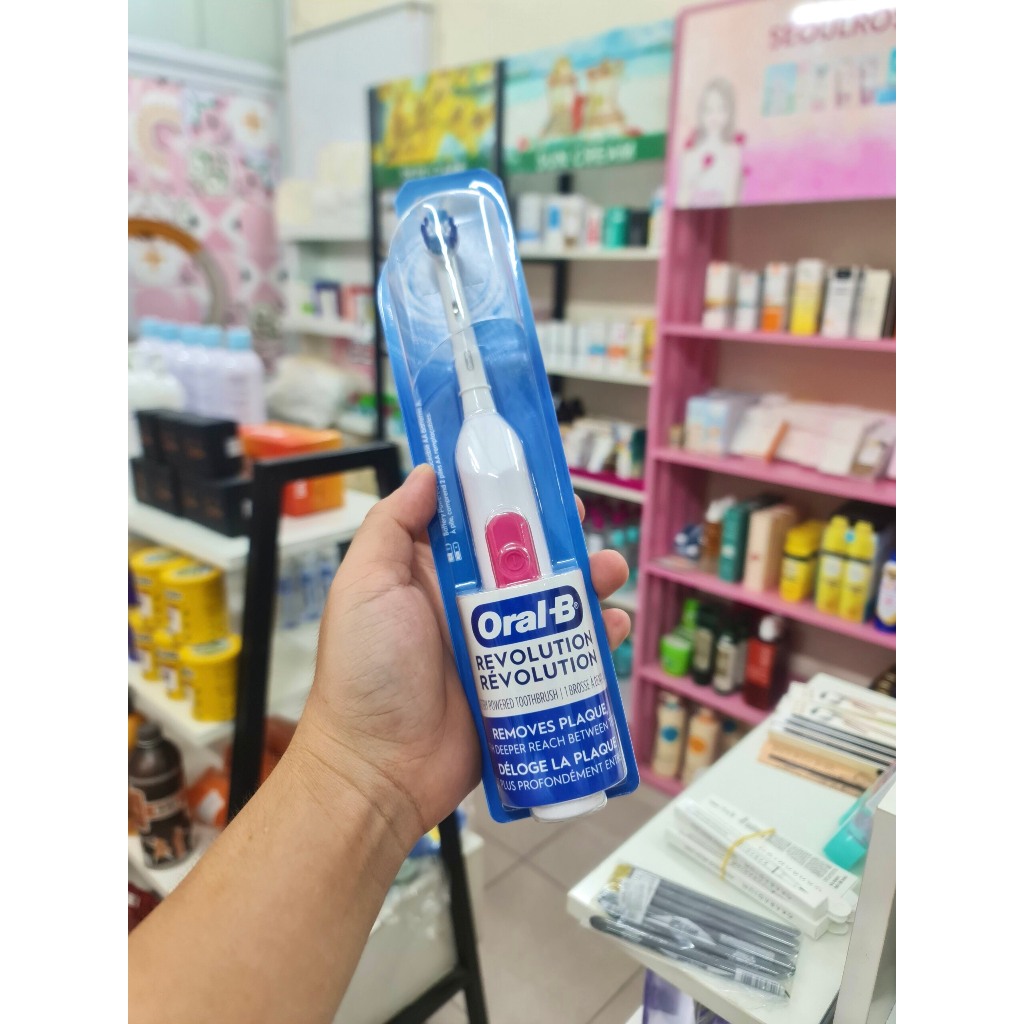 Bàn chải đánh răng dùng Pin Oral-B Revolution Battery Toothbrush with Brush Head