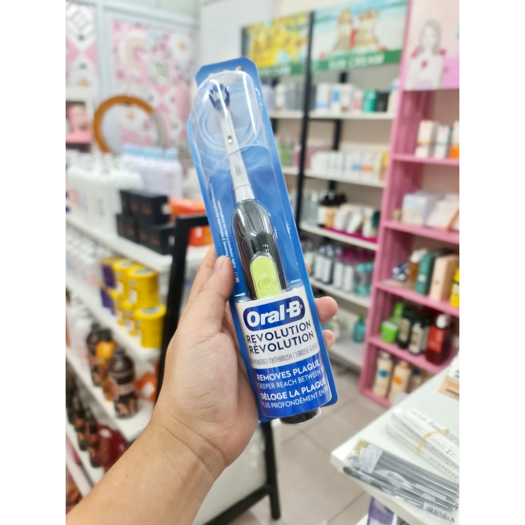 Bàn chải đánh răng dùng Pin Oral-B Revolution Battery Toothbrush with Brush Head