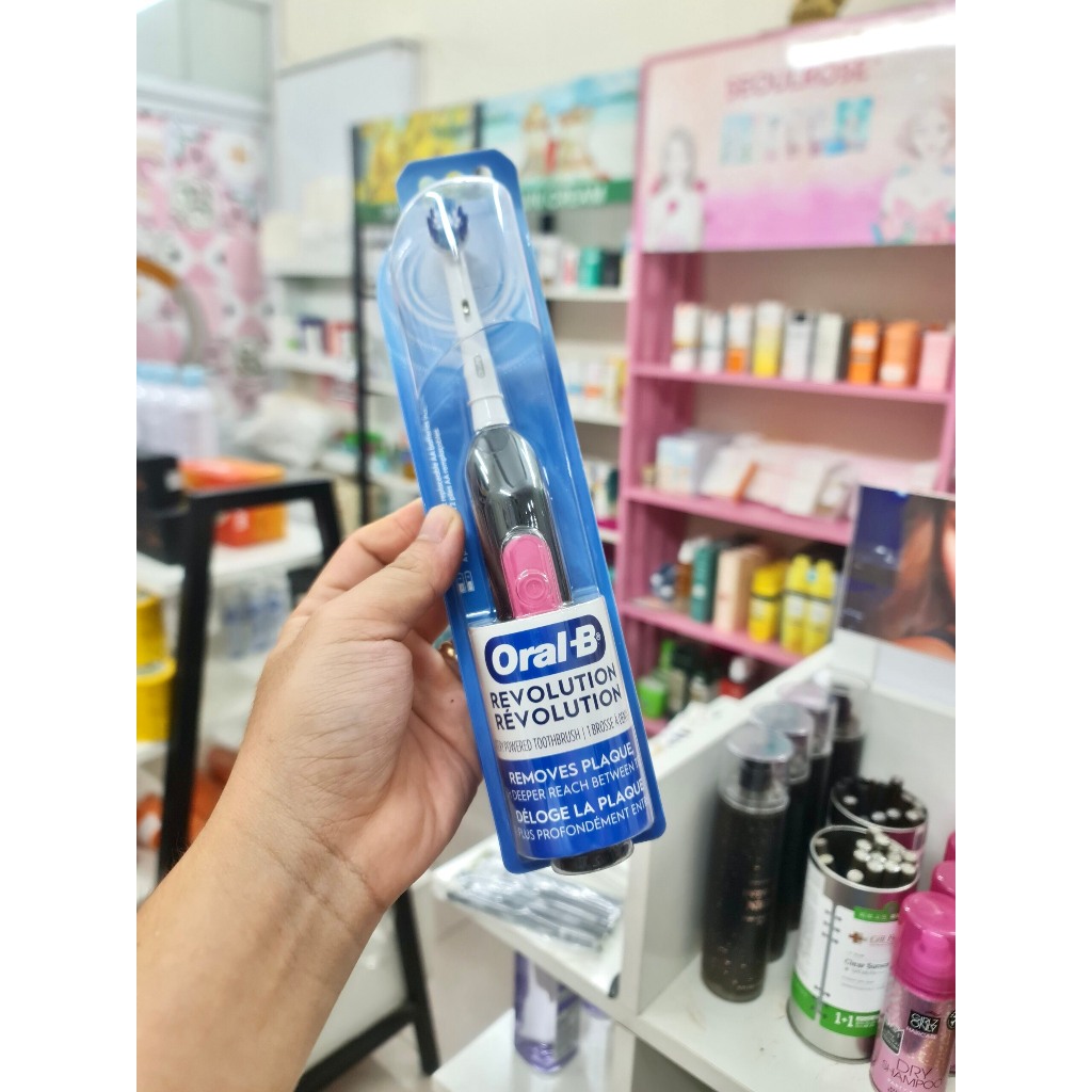 Bàn chải đánh răng dùng Pin Oral-B Revolution Battery Toothbrush with Brush Head