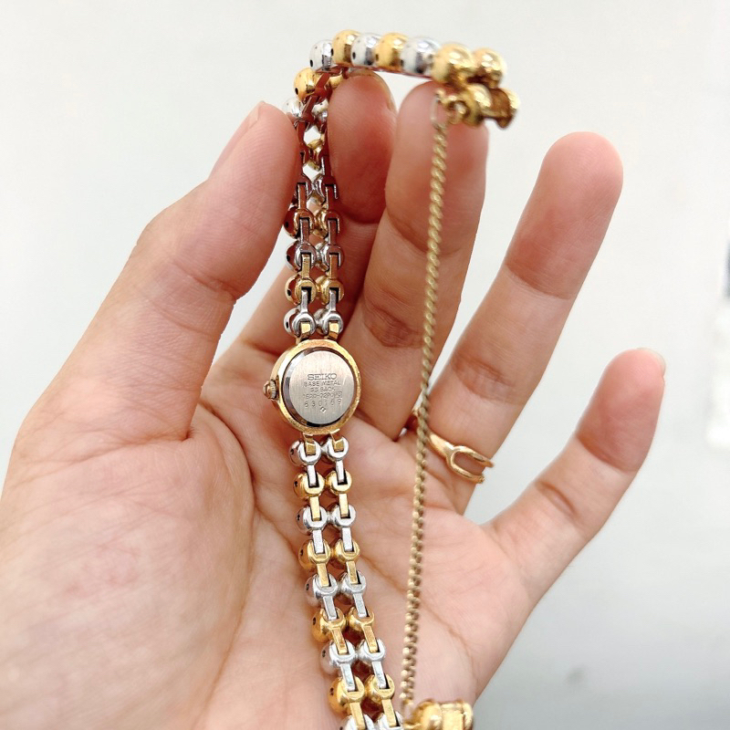 Đồng hồ si nữ hiệu Seiko dáng lắc bi vàng - Secondhand watch Seiko