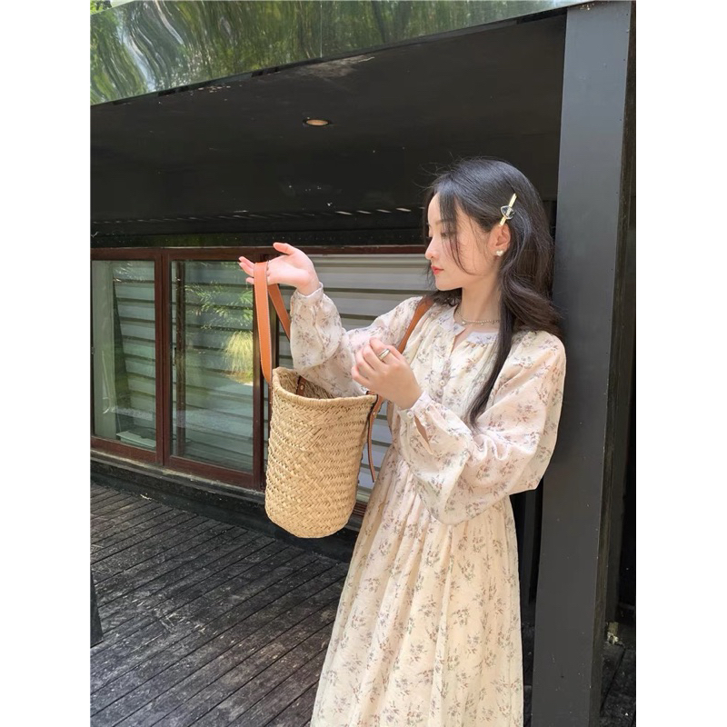 Váy hoa nhí dài tay cúc ở ngực lên dáng cực xinh