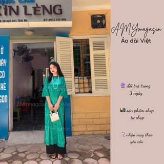 Áo dài gấm Liên Hoa xanh lá