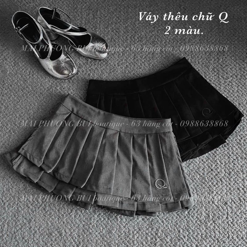 Chân váy thêu Q hàng QC L1
