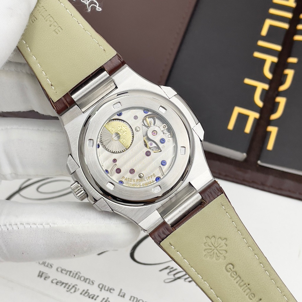 ĐỒNG HỒ NAM PATEK PHILIPPE NAUTINUS Br 5712 niềng đá baguette- Máy automatic - 40mm- chống nước-bảo hành 24 t