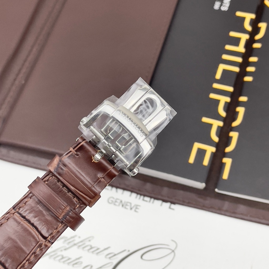 ĐỒNG HỒ NAM PATEK PHILIPPE NAUTINUS Br 5712 niềng đá baguette- Máy automatic - 40mm- chống nước-bảo hành 24 t