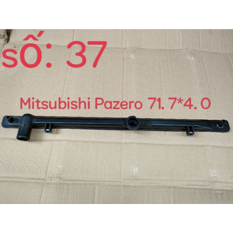 Vai-Nắp nhựa két nước oto Mitsubishi Pajero