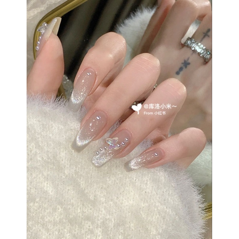 Mẫu nail mắt mèo gắn nơ buom xiêu xinh