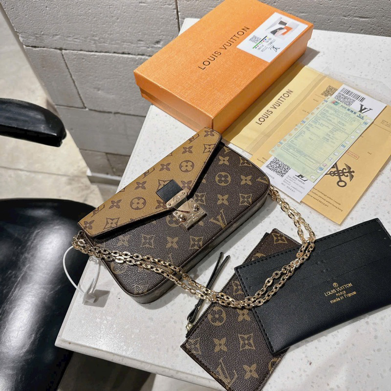 Túi L V 1 túi + 2 ví + 1 dây xích