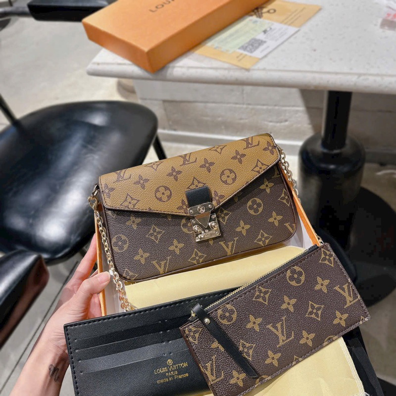 Túi L V 1 túi + 2 ví + 1 dây xích