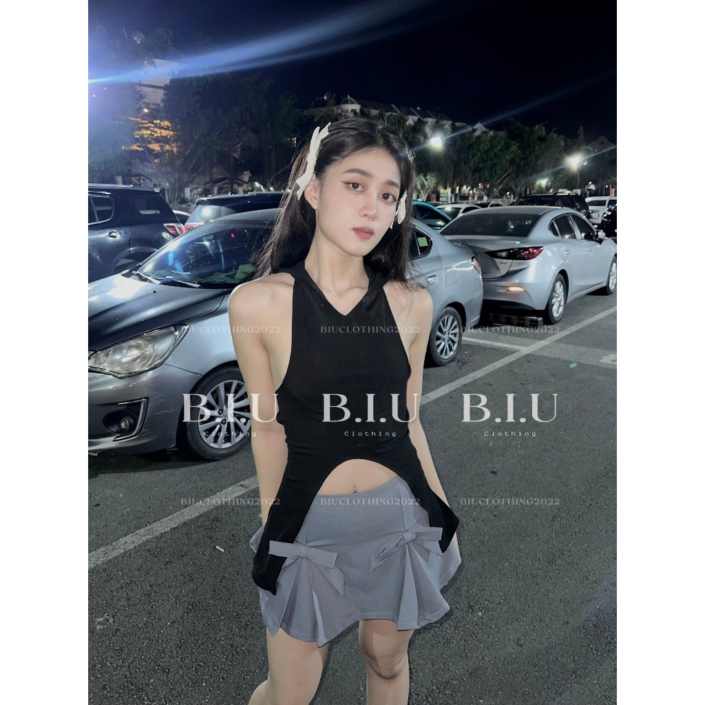 Set áo croptop kèm nón dây đôi hở lưng chân váy xếp ly đính nơ Jen Set Biu Clothing BB0159