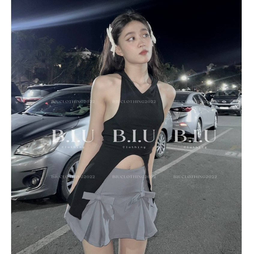 Set áo croptop kèm nón dây đôi hở lưng chân váy xếp ly đính nơ Jen Set Biu Clothing BB0159