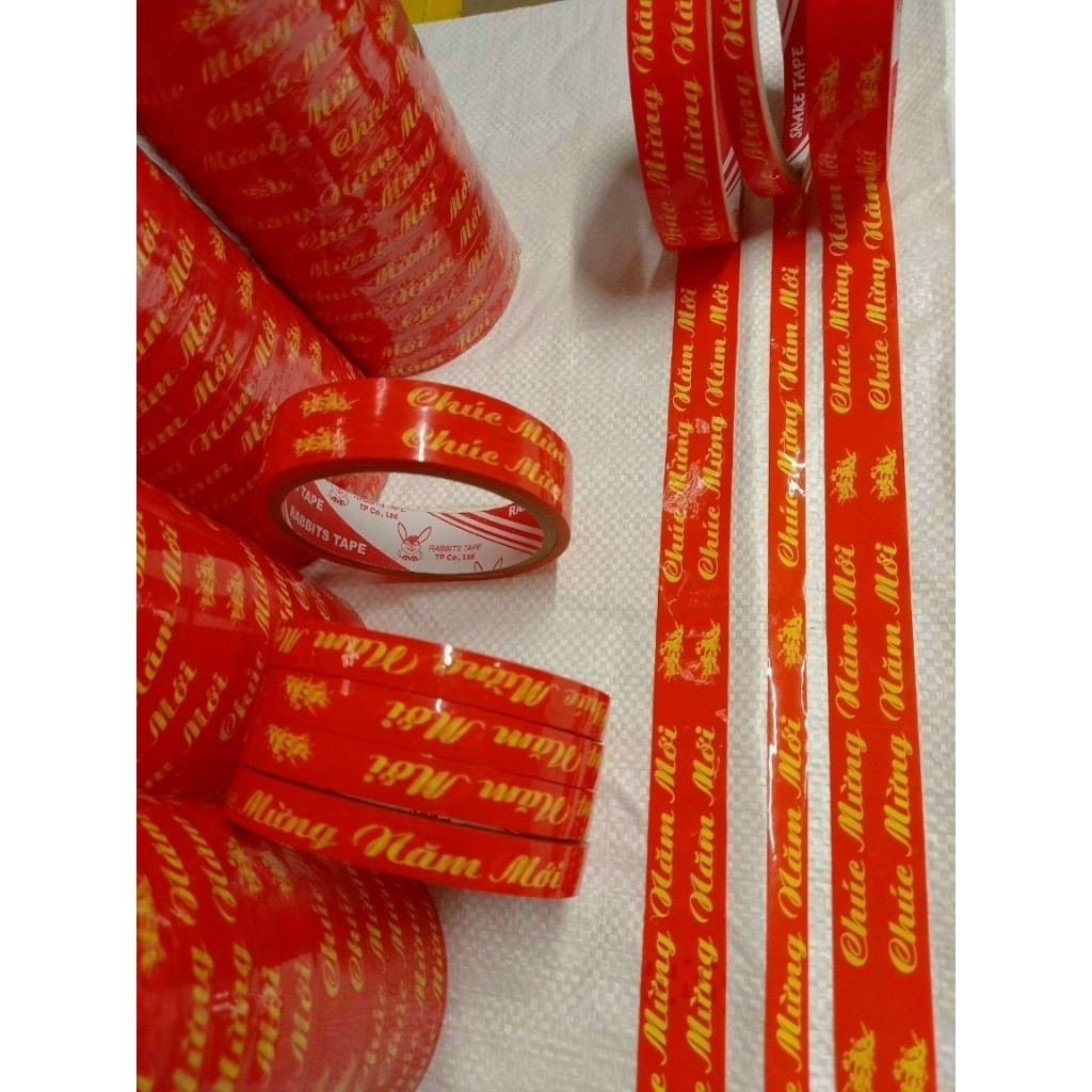 1 Cây Băng keo Chúc mừng năm mới 24 cuộn/cây 1F2 - Combo 24 cuộn 12mm, băng dính, băng keo gói quà tết