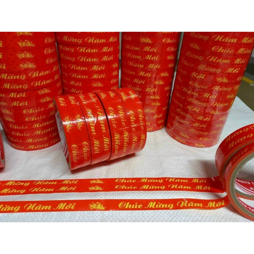 1 Cây Băng keo Chúc mừng năm mới 24 cuộn/cây 1F2 - Combo 24 cuộn 12mm, băng dính, băng keo gói quà tết