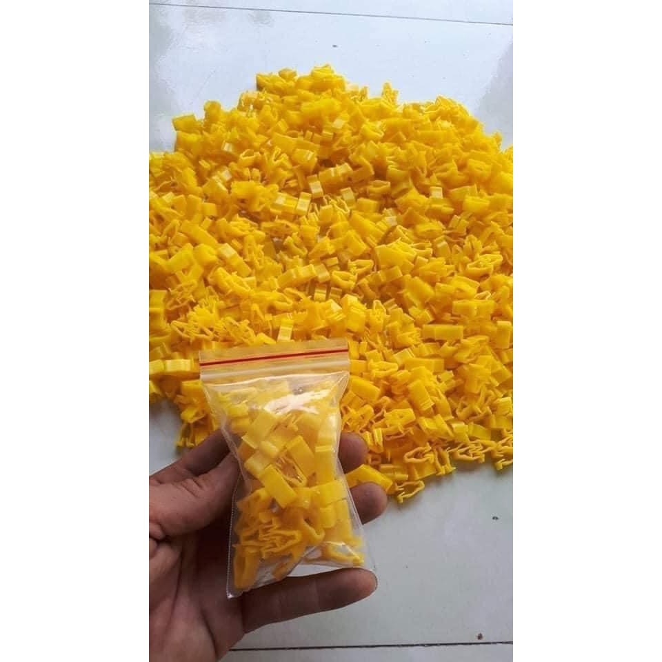Pát kẹp nhựa dàn áo màu vàng, màu trắng chuyên dụng cho xe Honda