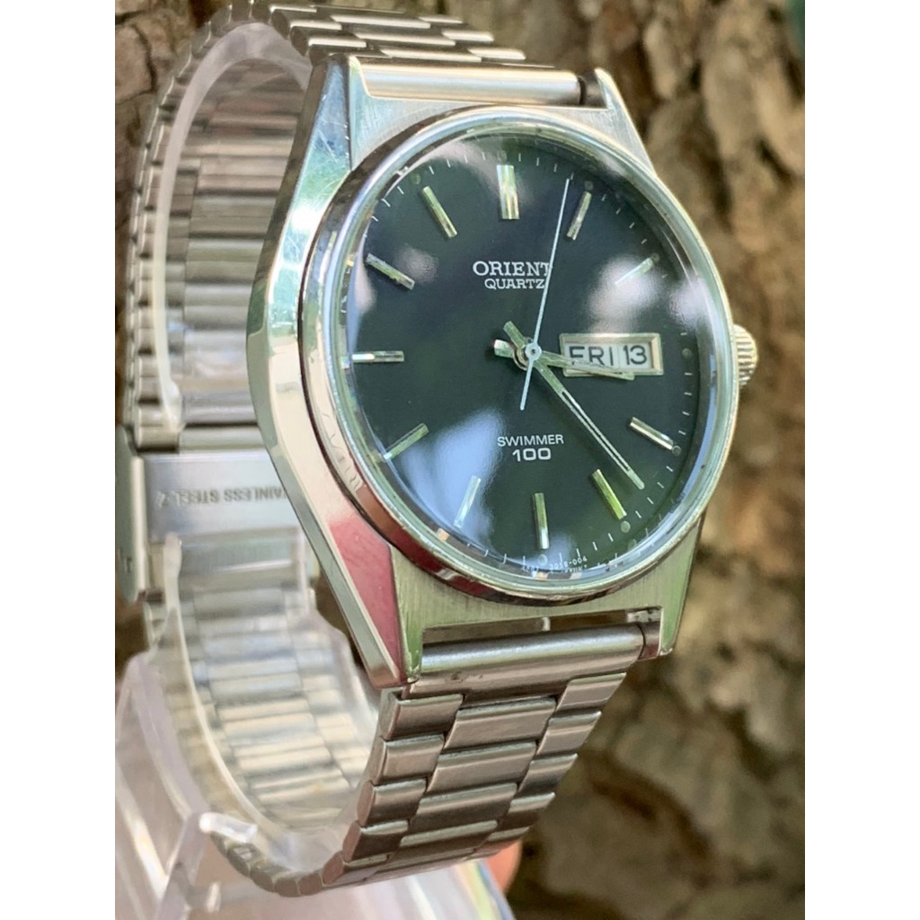 Đồng hồ nam Orient Pin , có ô cửa lịch, dây kim loạ