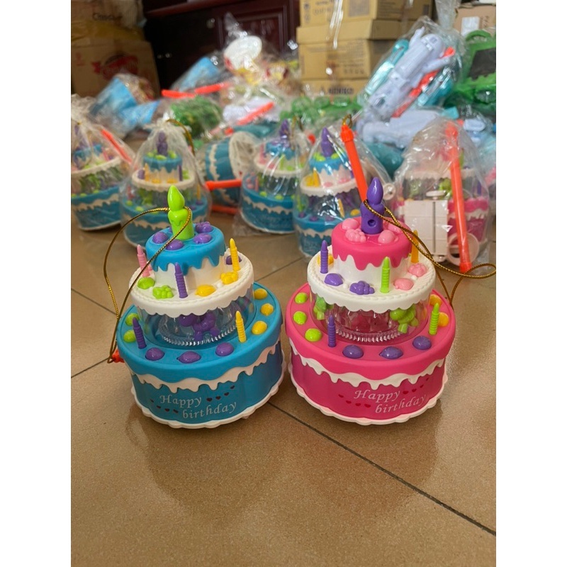 Đồ chơi hình bánh kem có đèn nhạc di chuyển được vui nhộn