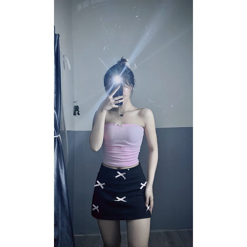 Chân váy đính nơ hồng