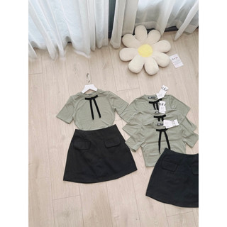 Sét bộ áo len zip cổ nơ chân váy đen