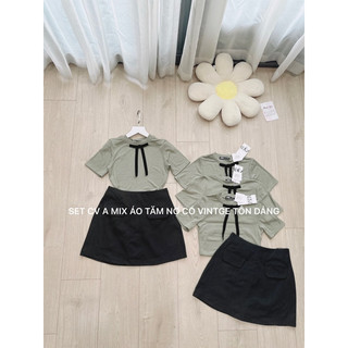 Sét bộ áo len zip cổ nơ chân váy đen