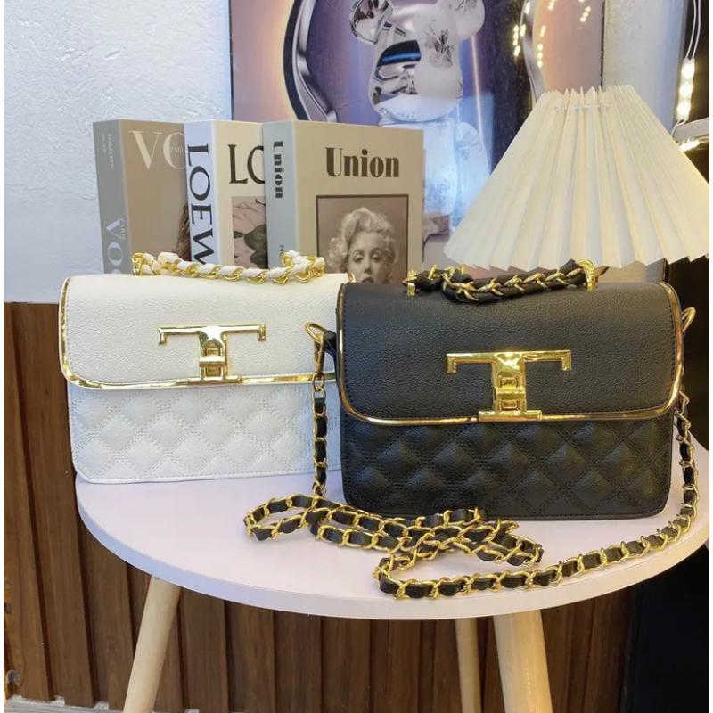 Túi xách túi đeo chéo nữ khoá T trần trám ba ngăn dây đeo phối xích k có chuông