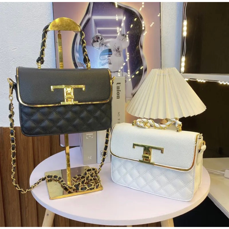 Túi xách túi đeo chéo nữ khoá T trần trám ba ngăn dây đeo phối xích k có chuông