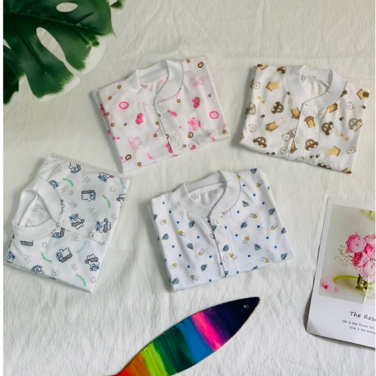 ÁO TRẮNG SƠ SINH IN HÌNH HỌA TIẾT CHO BÉ