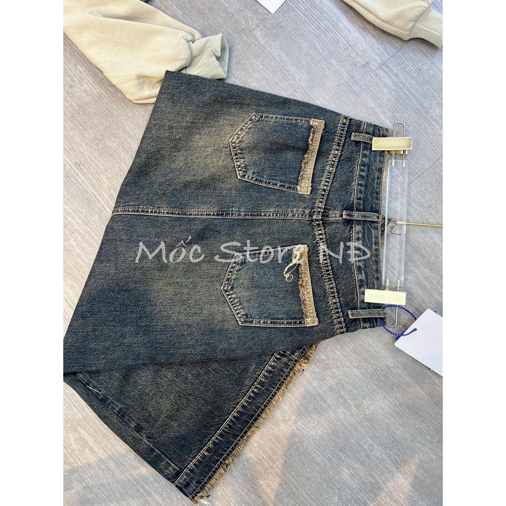 Chân váy jeans dài tua gấu xẻ sau màu tây