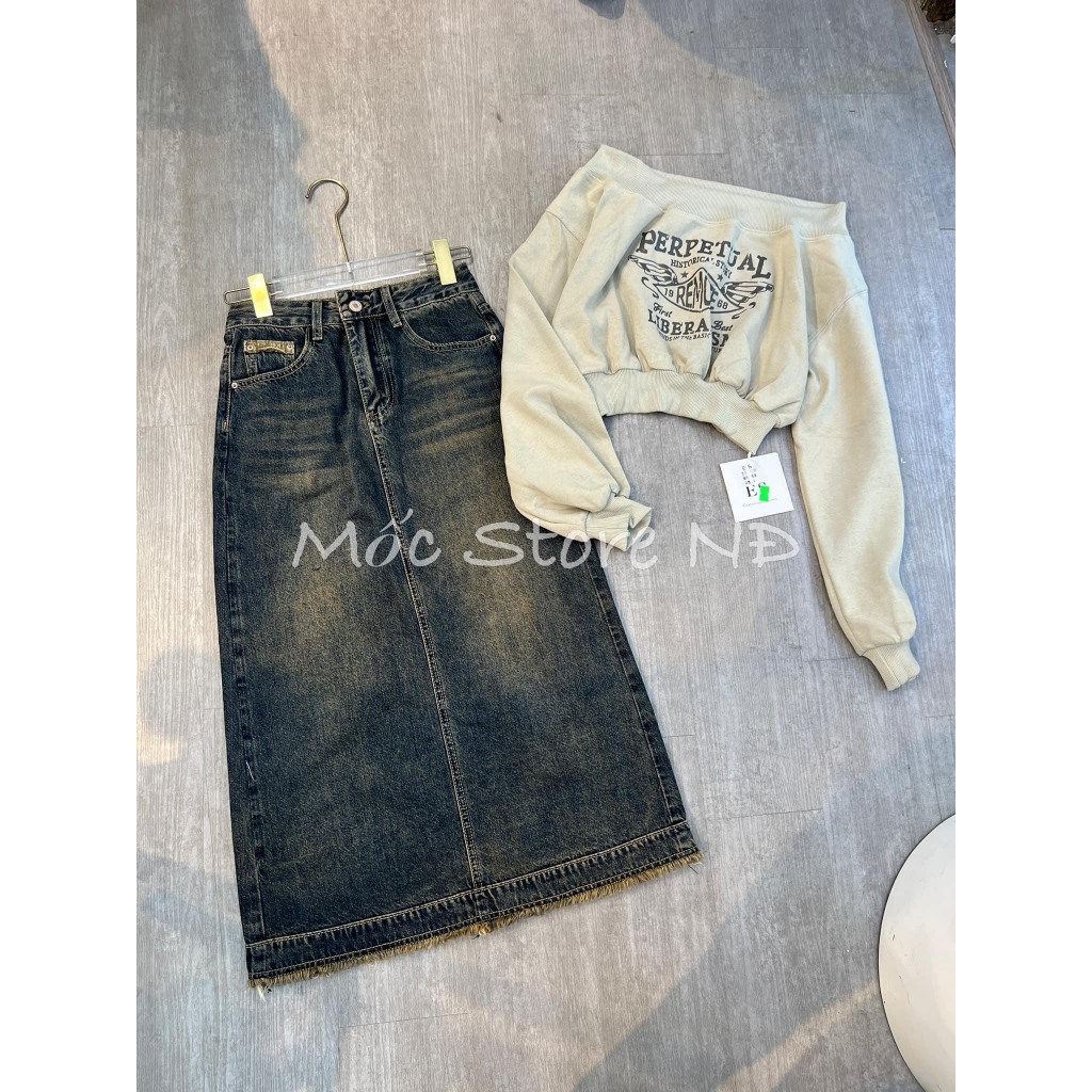 Chân váy jeans dài tua gấu xẻ sau màu tây