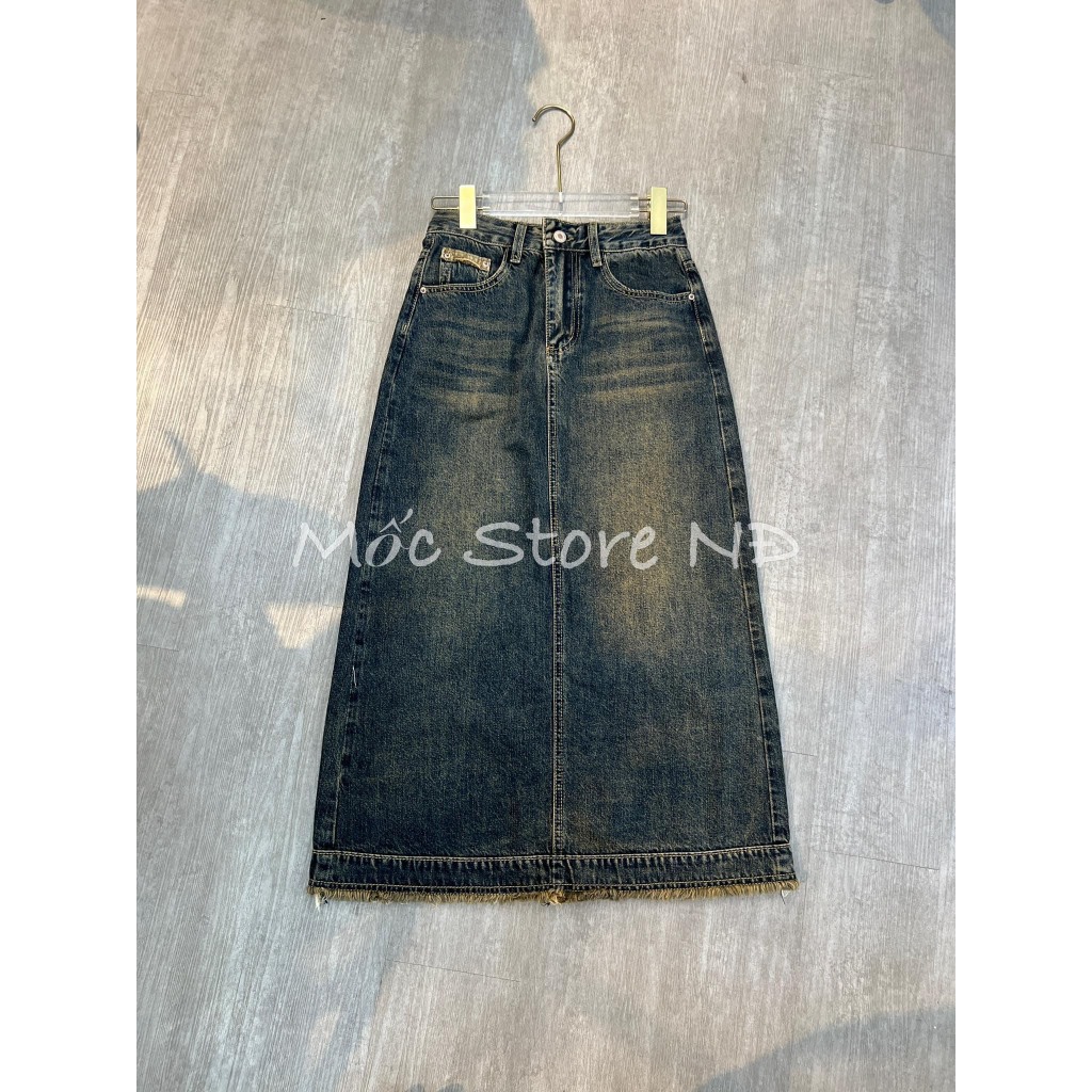 Chân váy jeans dài tua gấu xẻ sau màu tây