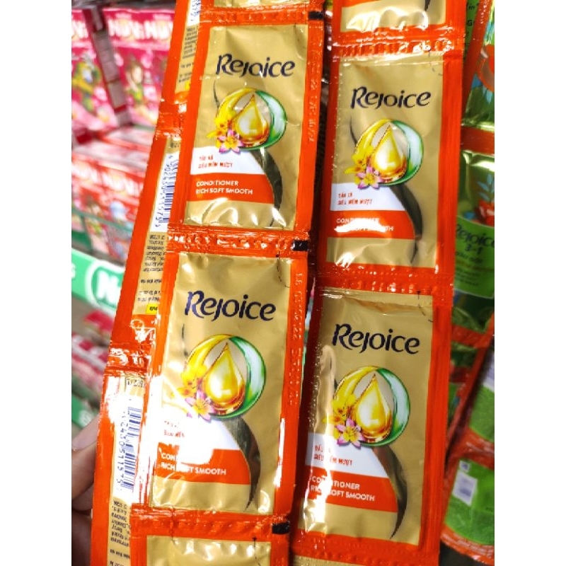 Dây 10 gói dầu xả Rejoice mềm mượt gói 6g