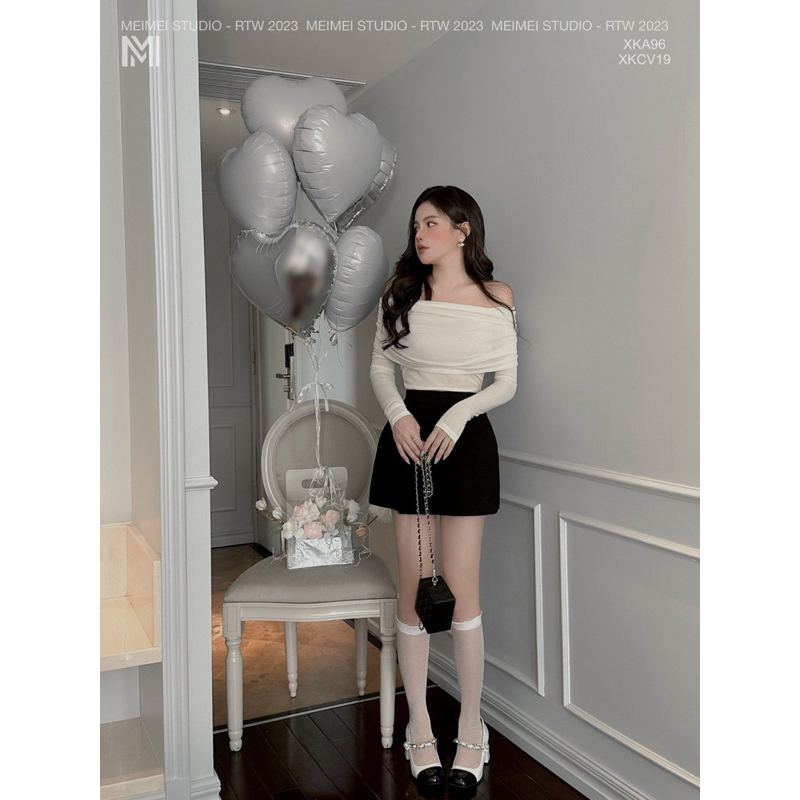 Áo len trễ vai dúm