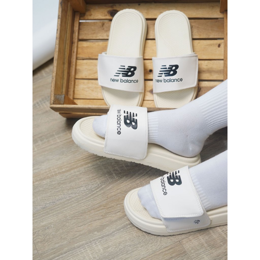 DÉP QUAI DÁN NGANG NAM NỮ NB LOGO CHỮ