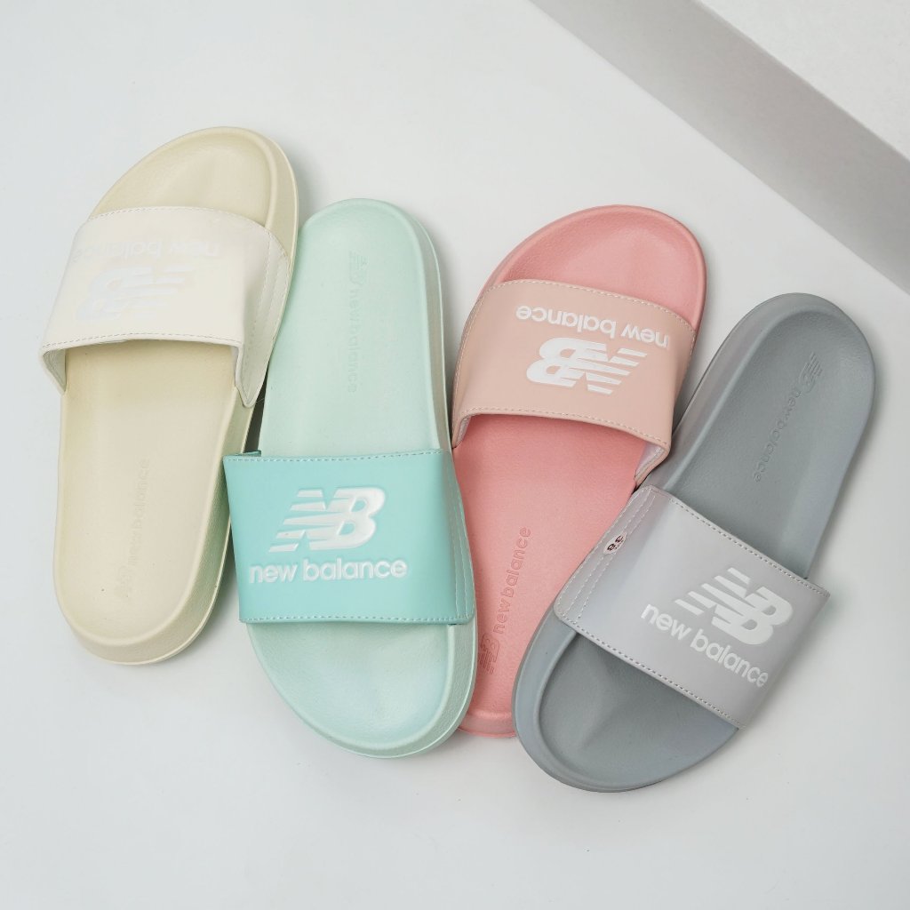 DÉP QUAI NGANG NỮ NB LOGO CHỮ