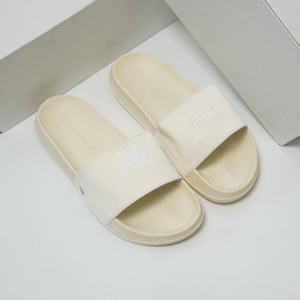 DÉP QUAI NGANG NỮ NB LOGO CHỮ