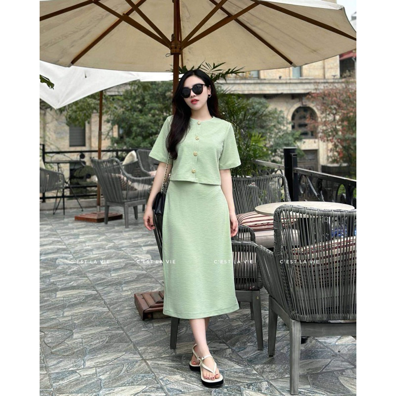 Áo xanh cúc đồng