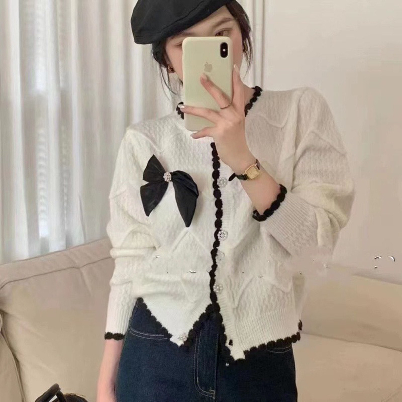 Áo len nơ đen trắng