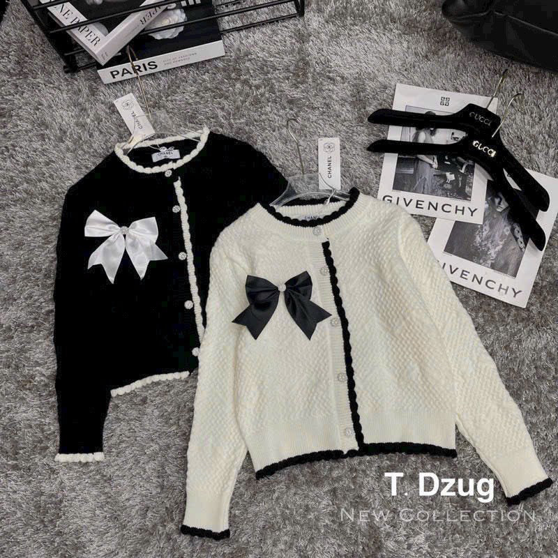 Áo len nơ đen trắng