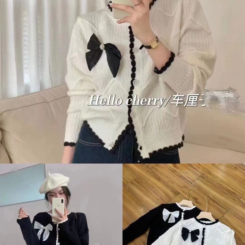 Áo len nơ đen trắng